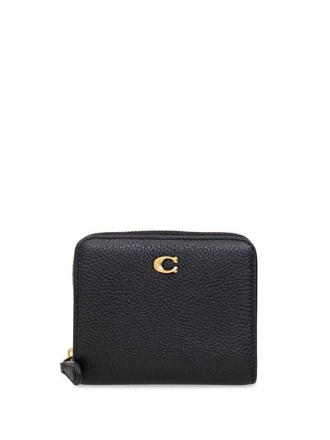 farfetch cartera coach.